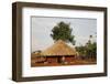 Ugandan child outside his home, Bweyale, Uganda-Godong-Framed Photographic Print