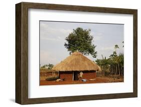 Ugandan child outside his home, Bweyale, Uganda-Godong-Framed Photographic Print