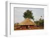 Ugandan child outside his home, Bweyale, Uganda-Godong-Framed Photographic Print