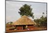 Ugandan child outside his home, Bweyale, Uganda-Godong-Mounted Photographic Print