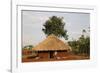 Ugandan child outside his home, Bweyale, Uganda-Godong-Framed Photographic Print