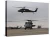 UH-60 Black Hawks Taxis Out for a Mission over Northern Iraq-null-Stretched Canvas