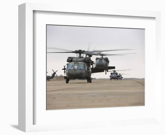 UH-60 Black Hawks Taxis Out for a Mission over Northern Iraq-null-Framed Photographic Print