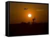 UH-60 Blackhawk Flies over Camp Speicher Airfield at Sunset-Stocktrek Images-Framed Stretched Canvas