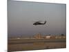 UH-60 Blackhawk Helicopter Flies Past the Tower on Camp Speicher-Stocktrek Images-Mounted Photographic Print