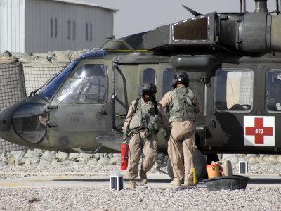 https://imgc.allpostersimages.com/img/posters/uh-60-blackhawk-medivac-helicopter-refuels-at-camp-warhorse-after-a-mission_u-L-P6FB9I0.jpg?artPerspective=n