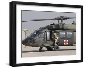 UH-60 Blackhawk Medivac Helicopter Refuels at Camp Warhorse after a Mission-Stocktrek Images-Framed Photographic Print