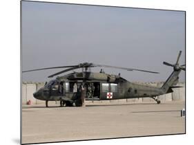 UH-60 Blackhawk Medivac Helicopter Refuels at Camp Warhorse after a Mission-Stocktrek Images-Mounted Photographic Print