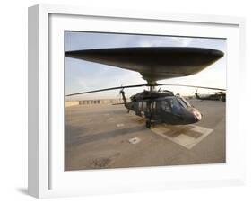 UH-60 Blackhawk Medivac Helicopter Sits on the Flight Deck at Camp Warhorse-Stocktrek Images-Framed Photographic Print