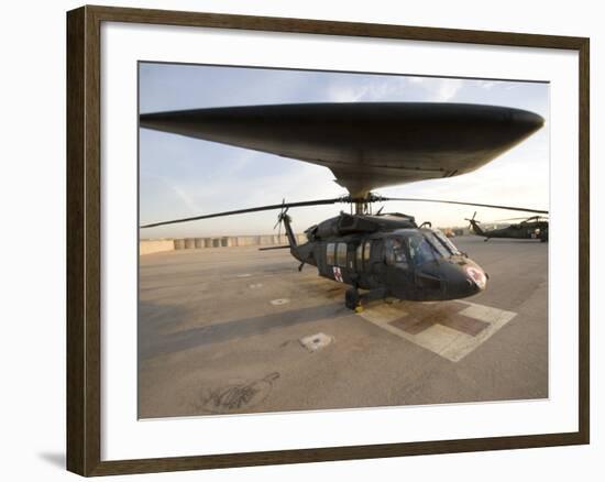 UH-60 Blackhawk Medivac Helicopter Sits on the Flight Deck at Camp Warhorse-Stocktrek Images-Framed Photographic Print