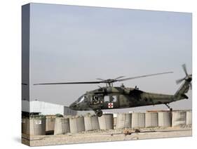 UH-60 Blackhawk Prepares to Land at Camp Warhorse to Refuel-Stocktrek Images-Stretched Canvas