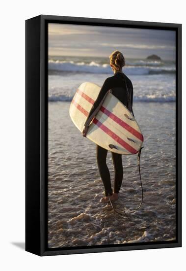 Uk, Cornwall, Polzeath. a Woman Looks Out to See, Preparing for an Evening Surf. Mr-Niels Van Gijn-Framed Stretched Canvas