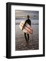 Uk, Cornwall, Polzeath. a Woman Looks Out to See, Preparing for an Evening Surf. Mr-Niels Van Gijn-Framed Photographic Print