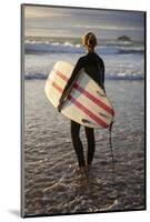 Uk, Cornwall, Polzeath. a Woman Looks Out to See, Preparing for an Evening Surf. Mr-Niels Van Gijn-Mounted Photographic Print