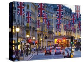 UK, England, London, Regent Street, Taxis and Union Jack Flags-Alan Copson-Stretched Canvas