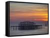 UK, England, Sussex, Brighton, Boat Sailing Past Remains of Brighton West Pier at Sunset-Jane Sweeney-Framed Stretched Canvas