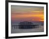 UK, England, Sussex, Brighton, Boat Sailing Past Remains of Brighton West Pier at Sunset-Jane Sweeney-Framed Photographic Print