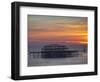 UK, England, Sussex, Brighton, Boat Sailing Past Remains of Brighton West Pier at Sunset-Jane Sweeney-Framed Photographic Print