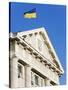 Ukrainian Flag Atop Classical Architecture, Kiev, Ukraine, Europe-Christian Kober-Stretched Canvas