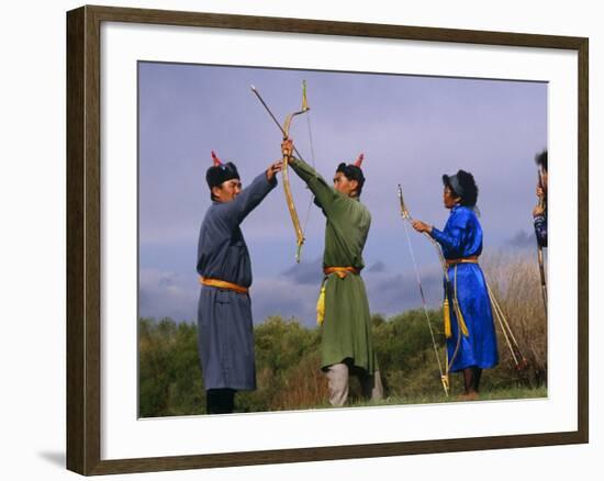 Ulan Bator, Family Competing in an Archery Competition at the National Day Celebrations, Mongolia-Paul Harris-Framed Photographic Print