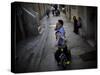 Ultra-Orthodox Jewish Children Cover their Faces as They Play in a Street in Jerusalem-null-Stretched Canvas