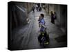 Ultra-Orthodox Jewish Children Cover their Faces as They Play in a Street in Jerusalem-null-Stretched Canvas