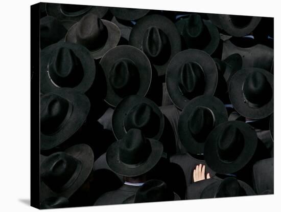 Ultra Orthodox Jewish Men Look on as They Watch the Burial of Prominent Jewish Rabbi Shlomo Wolbe-null-Stretched Canvas