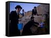 Ultra-Orthodox Jewish Men Stand Next to a Well as They Fill Canisters with Water in Jerusalem-null-Framed Stretched Canvas