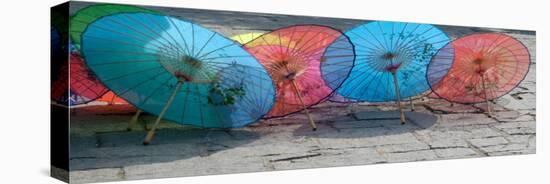 Umbrellas For Sale on the Streets, Shandong Province, Jinan, China-Bruce Behnke-Stretched Canvas