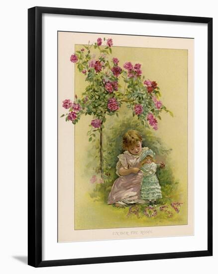 Under a Rose Bush in the Garden, a Little Girl Adjusts Her Doll's Clothing-null-Framed Art Print