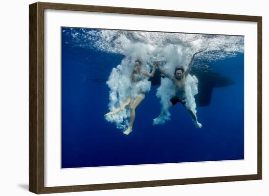 Underwater View of the Young Couple Having Fun and Jumping into the Clear Sea from a Boat-Dudarev Mikhail-Framed Photographic Print