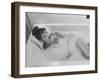 Unexposed Nude Woman in the Bathtub Amid the Bubbles While Smoking a Cigarette-Peter Stackpole-Framed Photographic Print