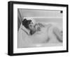 Unexposed Nude Woman in the Bathtub Amid the Bubbles While Smoking a Cigarette-Peter Stackpole-Framed Photographic Print