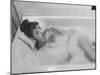 Unexposed Nude Woman in the Bathtub Amid the Bubbles While Smoking a Cigarette-Peter Stackpole-Mounted Photographic Print