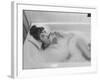 Unexposed Nude Woman in the Bathtub Amid the Bubbles While Smoking a Cigarette-Peter Stackpole-Framed Photographic Print