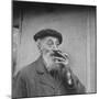Unidentified Man Smelling a Truffle-Thomas D^ Mcavoy-Mounted Photographic Print