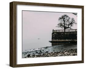 Unidentified woman looking at Lake Maggiore on a cold winter's day, Piedmont, Italian Lakes, Italy,-Alexandre Rotenberg-Framed Photographic Print