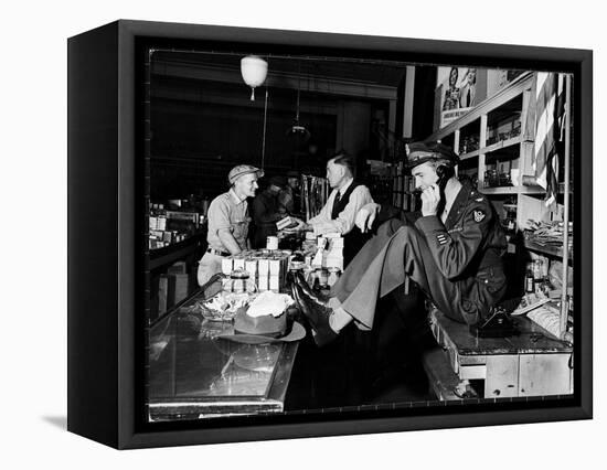 Uniformed Actor/Pilot, Col. Jimmy Stewart Talking on Telephone at Father's Hardware Store-Peter Stackpole-Framed Stretched Canvas