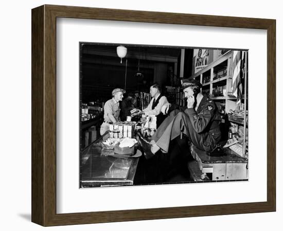 Uniformed Actor/Pilot, Col. Jimmy Stewart Talking on Telephone at Father's Hardware Store-Peter Stackpole-Framed Photographic Print