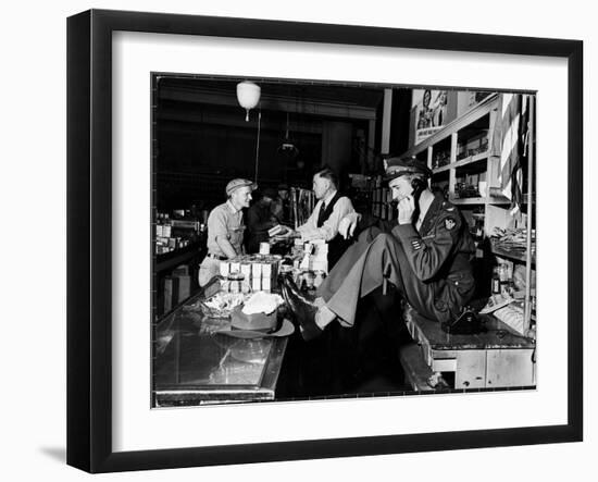 Uniformed Actor/Pilot, Col. Jimmy Stewart Talking on Telephone at Father's Hardware Store-Peter Stackpole-Framed Premium Photographic Print