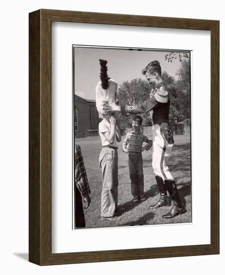 Uniformed Drum Major for the University of Michigan Marching Band on a March Across the Campus Lawn-Alfred Eisenstaedt-Framed Photographic Print