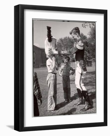 Uniformed Drum Major for the University of Michigan Marching Band on a March Across the Campus Lawn-Alfred Eisenstaedt-Framed Photographic Print