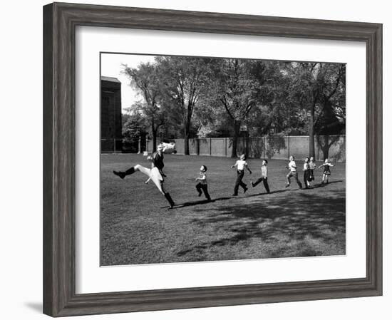 Uniformed Drum Major For University of Michigan Marching Band Practicing His High Kicking Prance-Alfred Eisenstaedt-Framed Photographic Print