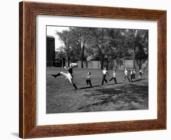 Uniformed Drum Major For University of Michigan Marching Band Practicing His High Kicking Prance-Alfred Eisenstaedt-Framed Photographic Print