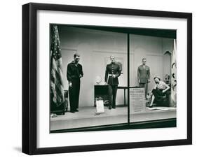 Uniforms in Store Window-null-Framed Art Print