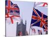 Union Jack and Other Flags, London, England-Walter Bibikow-Stretched Canvas