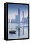 United Arab Emirates, Abu Dhabi, View of City Skyline Reflecting in Persian Gulf-Jane Sweeney-Framed Stretched Canvas