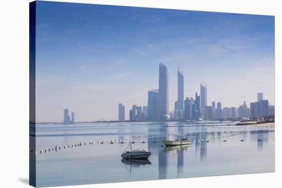 United Arab Emirates, Abu Dhabi, View of City Skyline Reflecting in Persian Gulf-Jane Sweeney-Stretched Canvas