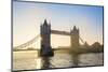 United Kingdom, England, London. Early morning sun rising behind Tower Bridge over the River Thames-Jason Langley-Mounted Photographic Print