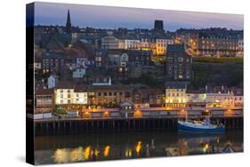 United Kingdom, England, North Yorkshire, Whitby. a View of the Harbour at Dusk.-Nick Ledger-Stretched Canvas